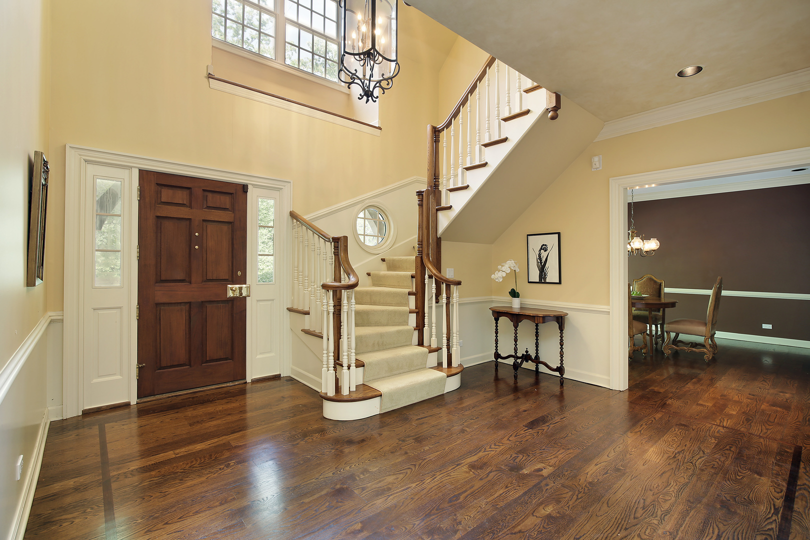 1565 South Ridge Road Lake Forest, IL 60045 - Photo 3 of 26 a view of entryway with stairs and wooden floor