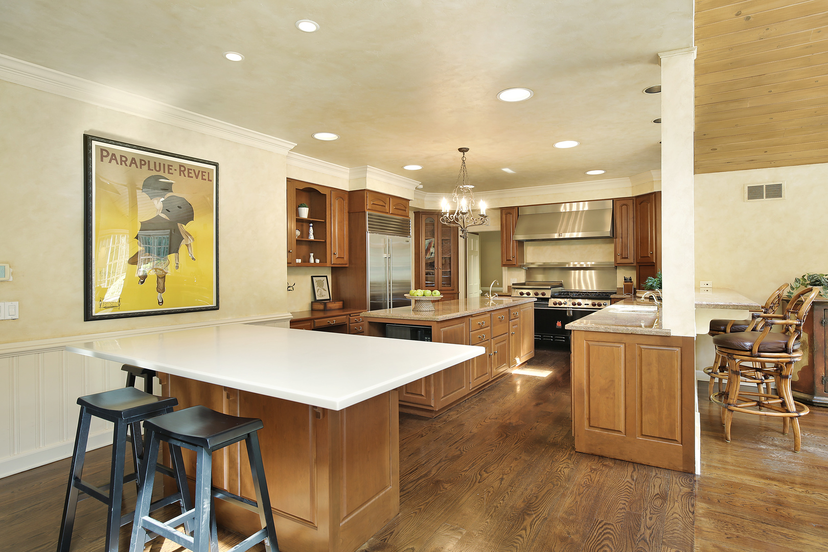 1565 South Ridge Road Lake Forest, IL 60045 - Photo 7 of 26 a large kitchen with kitchen island a table and chairs