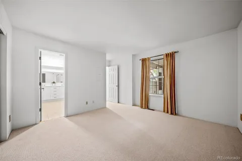 a view of empty room with windows