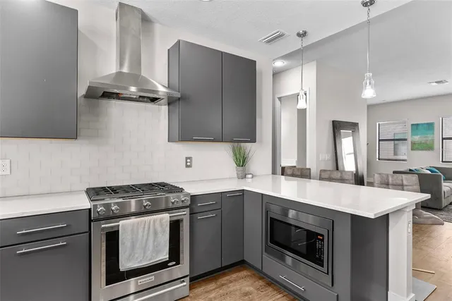 a vase of flowers sitting on a table