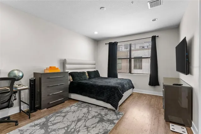 a bathroom with a shower and a toilet