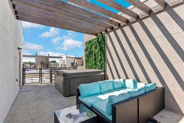 a view of a garage with rack and bicycle