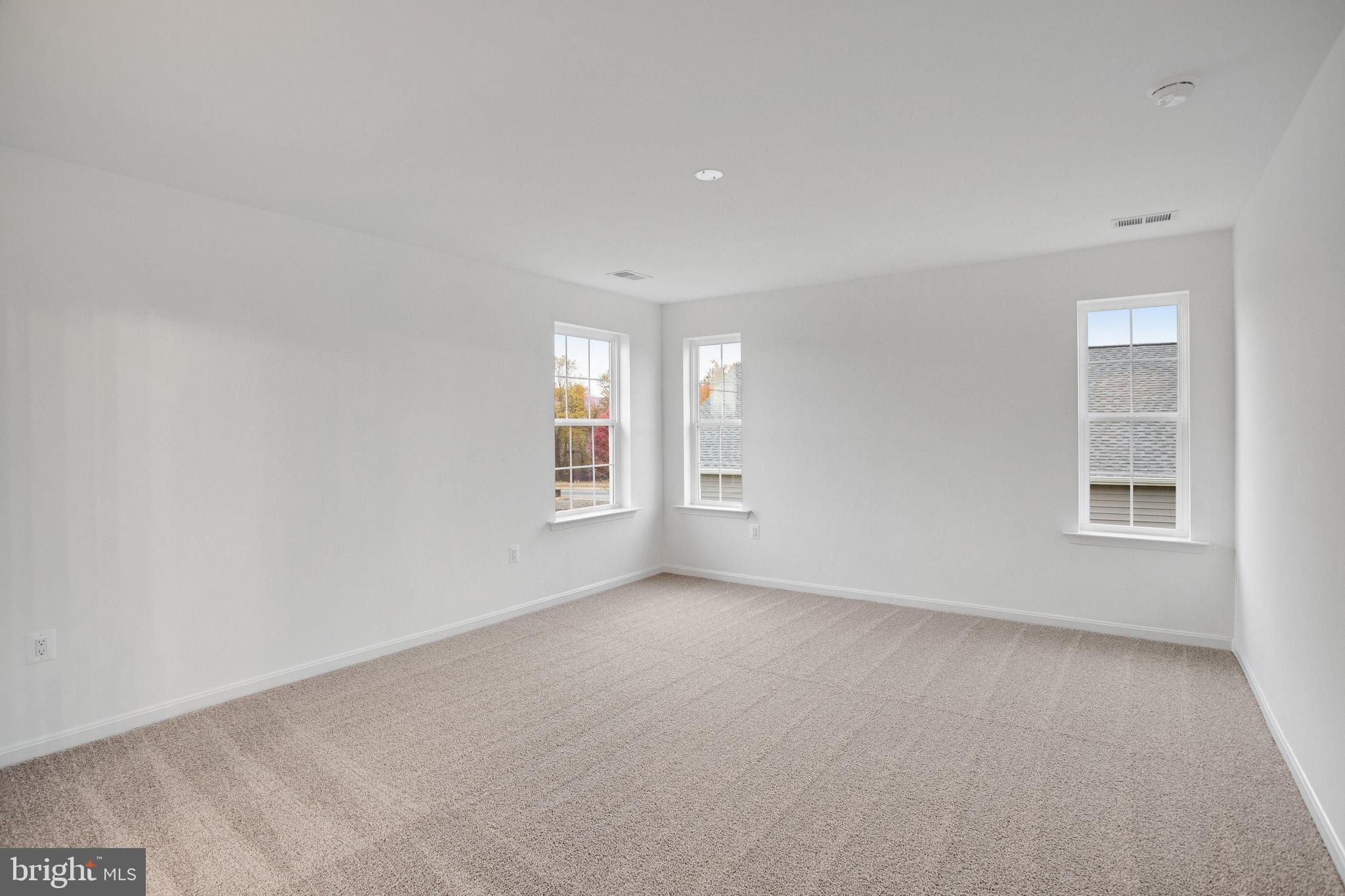 2009 Divot Drive Culpeper, VA 22701 - Photo 22 of 46 an empty room with windows