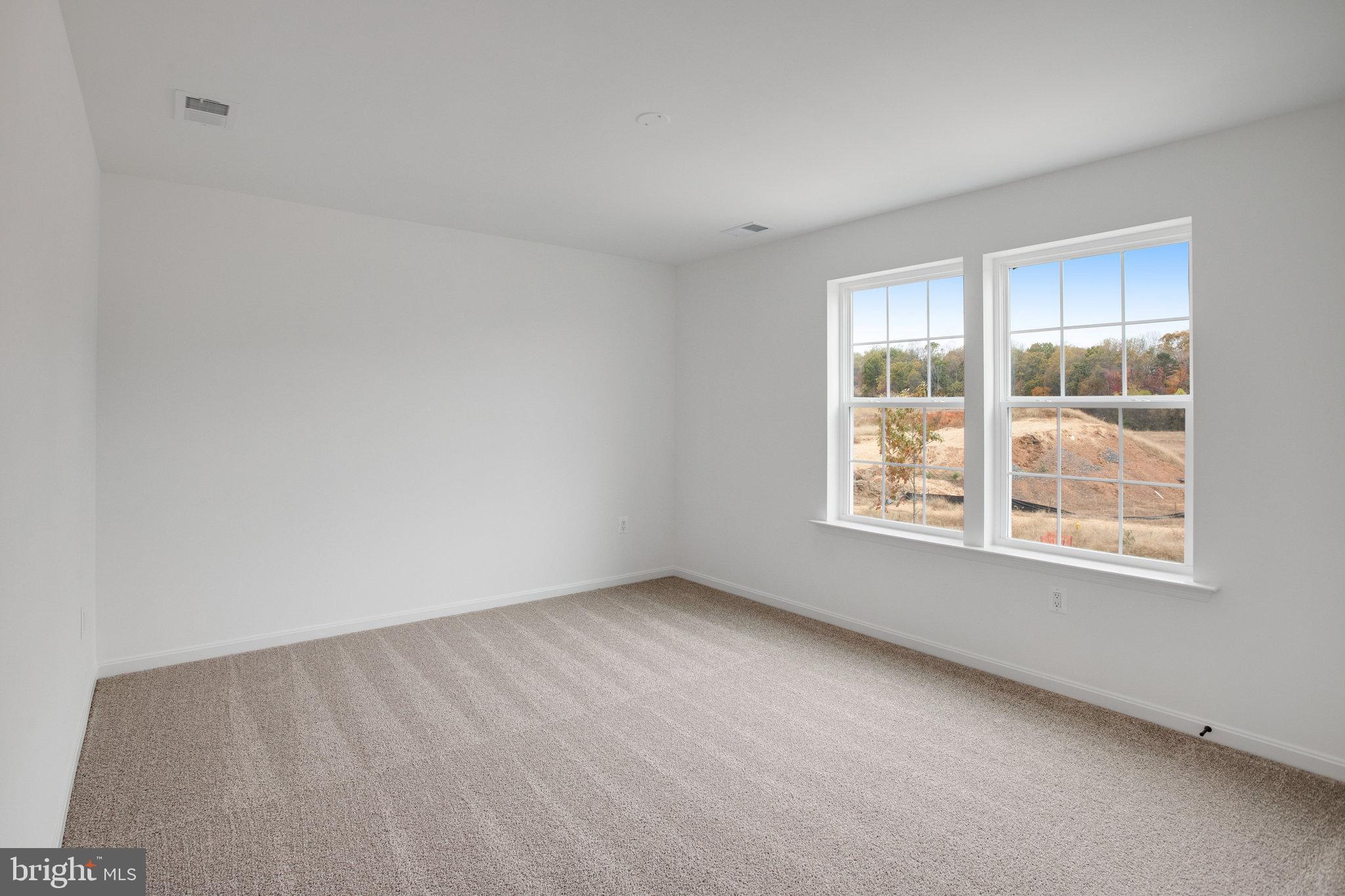 2009 Divot Drive Culpeper, VA 22701 - Photo 31 of 46 an empty room with windows