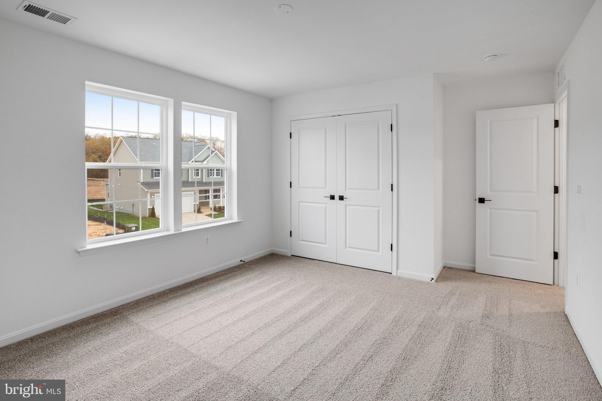 2009 Divot Drive Culpeper, VA 22701 - Photo 32 of 46 a view of an empty room with a window