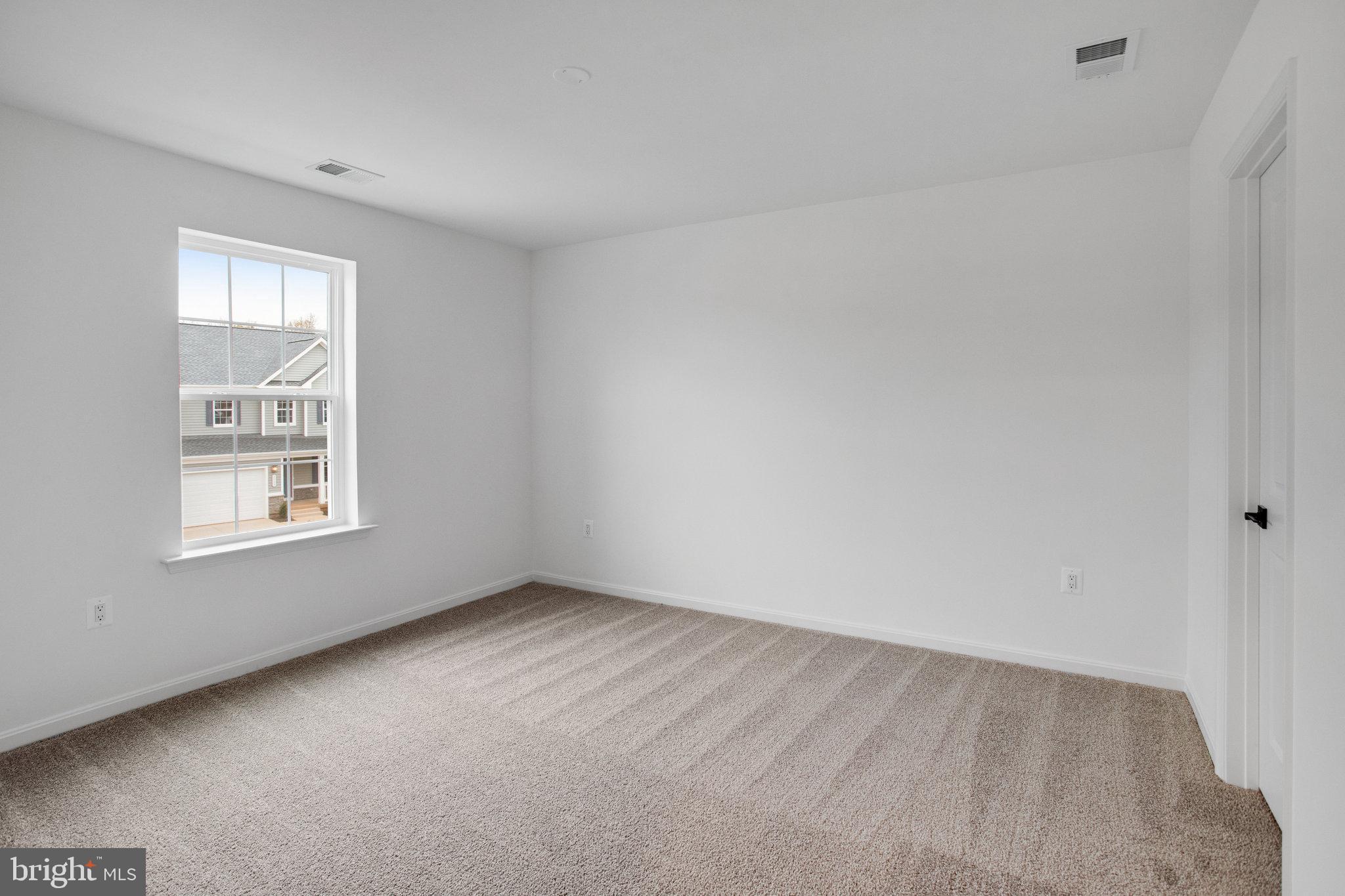 2009 Divot Drive Culpeper, VA 22701 - Photo 33 of 46 an empty room with windows