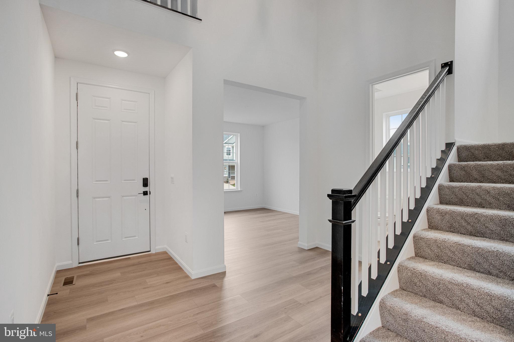 2009 Divot Drive Culpeper, VA 22701 - Photo 4 of 46 a view of an entryway with wooden floor