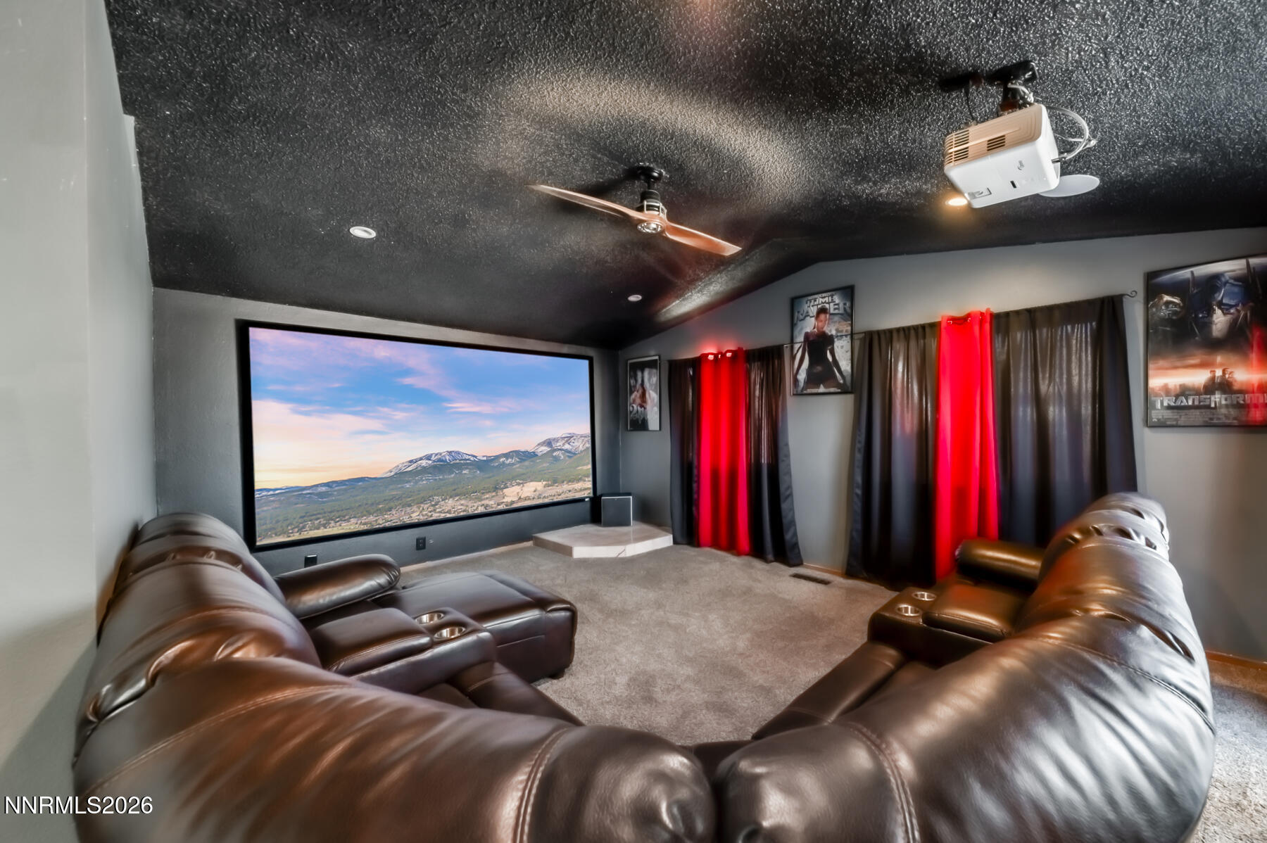 370 Maple Street Fernley, NV 89408 - Photo 14 of 32 a room with furniture projector and screen