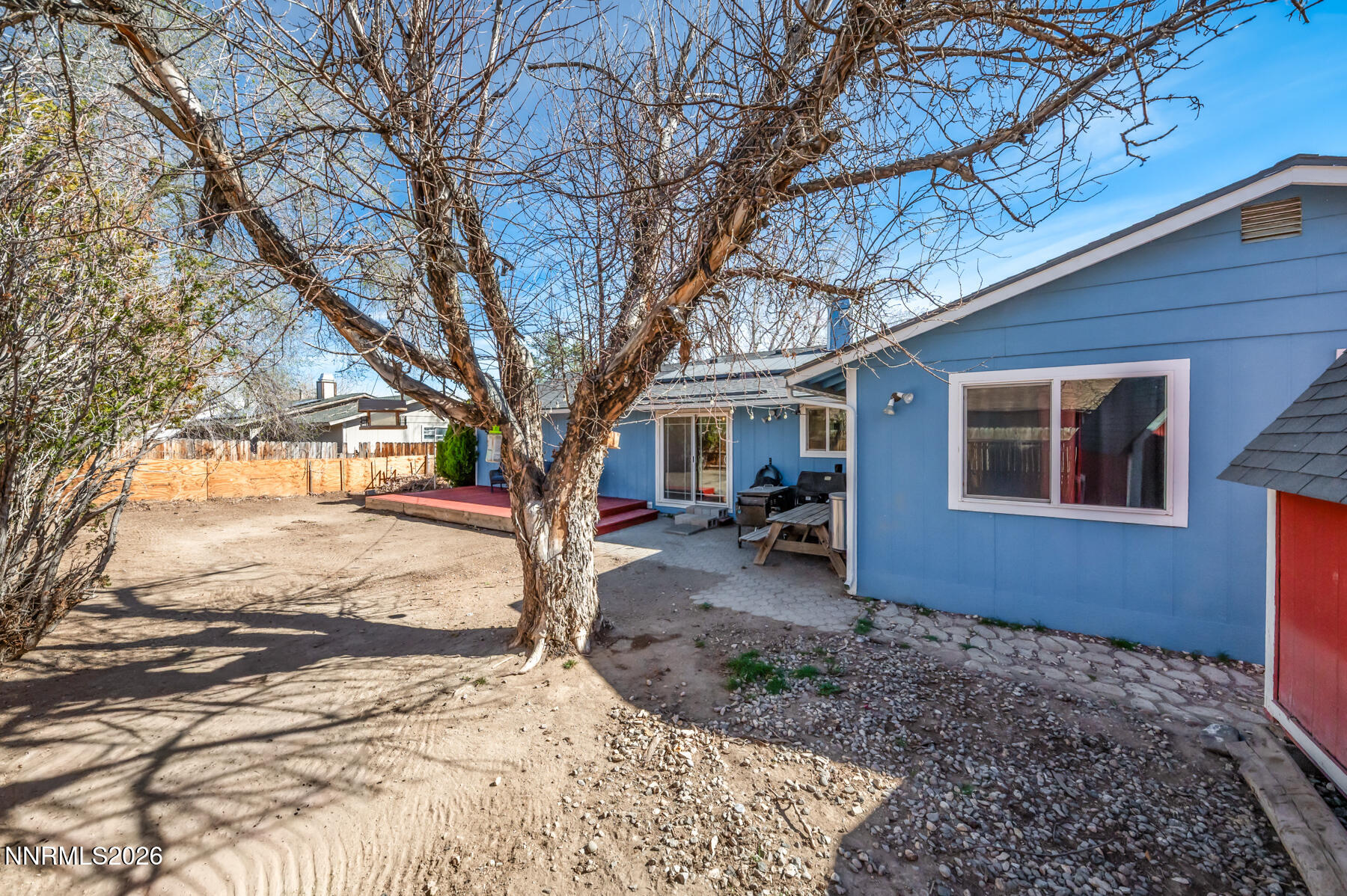 370 Maple Street Fernley, NV 89408 - Photo 24 of 32 a view of a house with a yard covered in snow