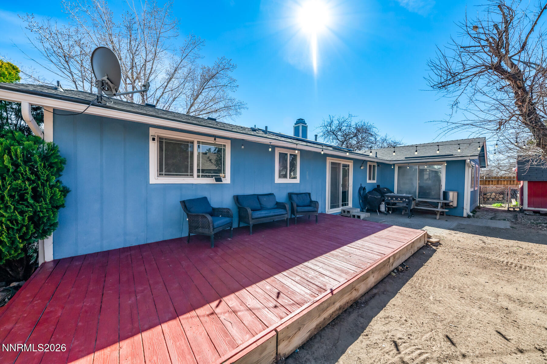 370 Maple Street Fernley, NV 89408 - Photo 27 of 32 a view of a house with backyard and sitting area