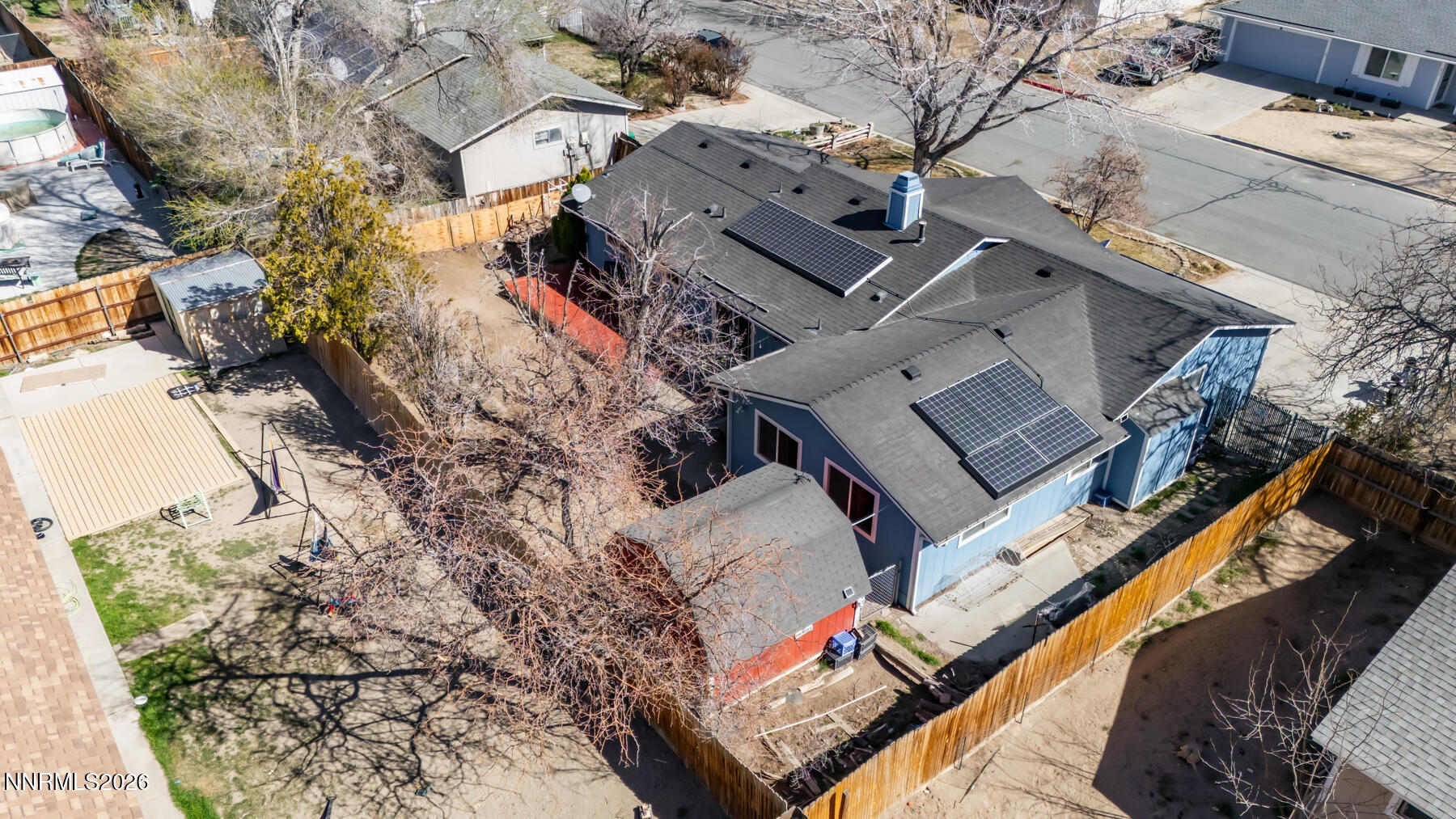 370 Maple Street Fernley, NV 89408 - Photo 32 of 32 an aerial view of a house with a yard
