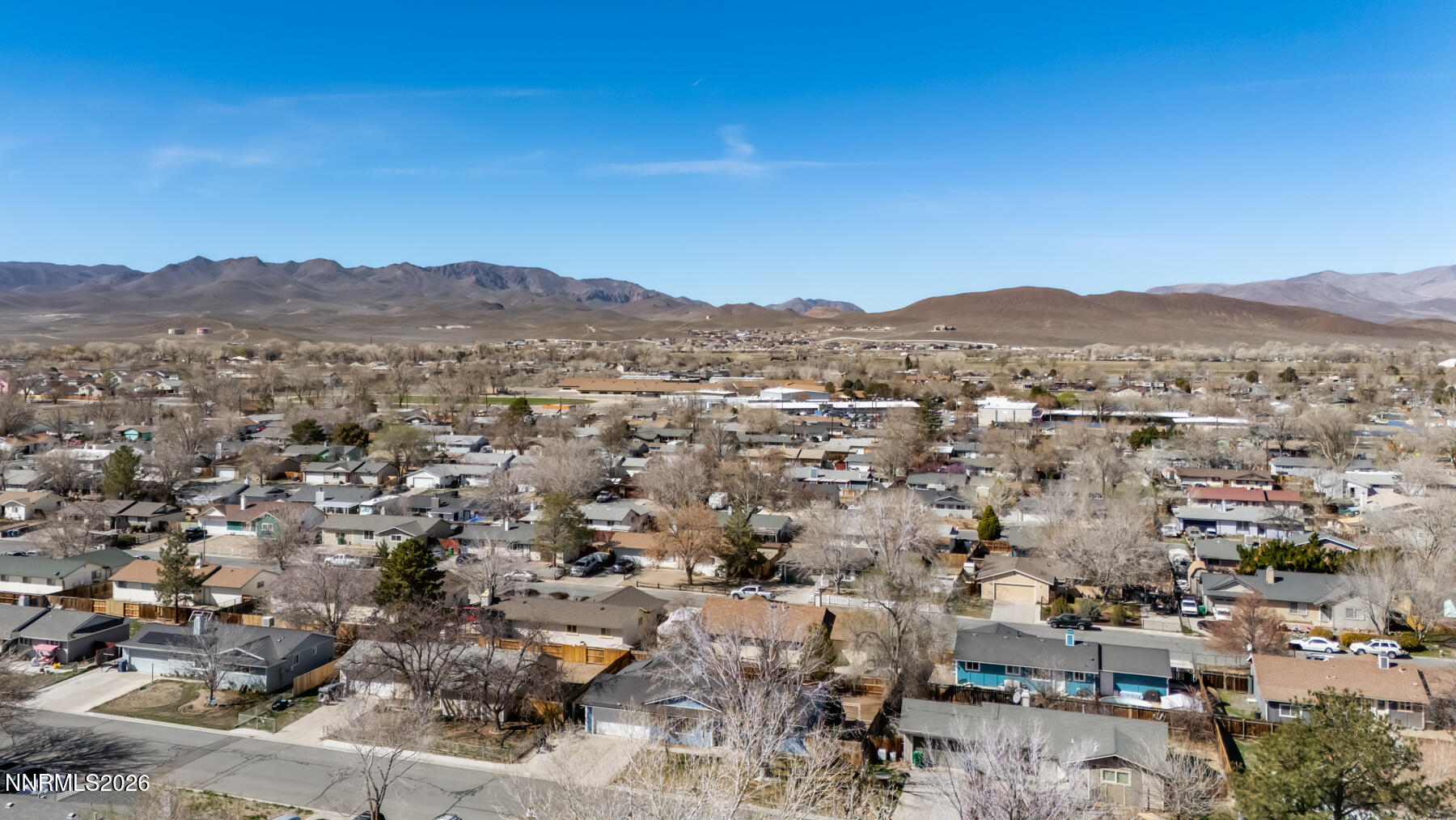 370 Maple Street Fernley, NV 89408 - Photo 4 of 32 an aerial view of residential house and green space
