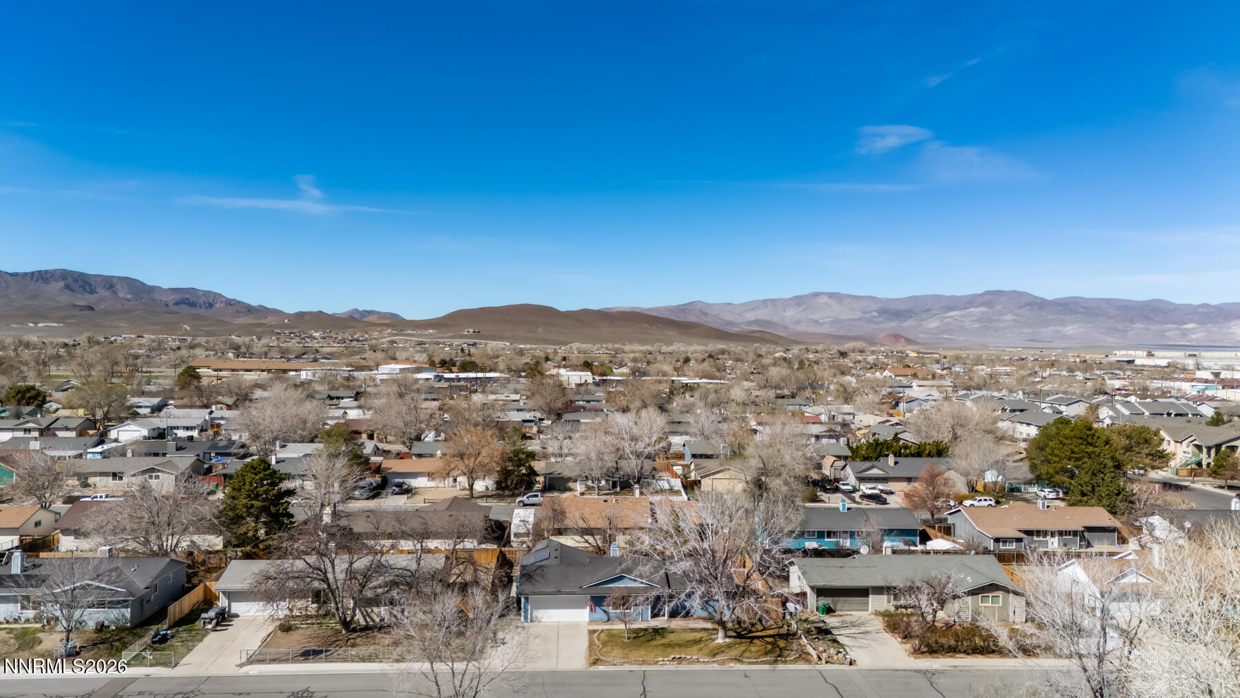 370 Maple Street Fernley, NV 89408 - Photo 5 of 32 an aerial view of residential house and green space