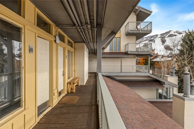 a view of balcony with furniture