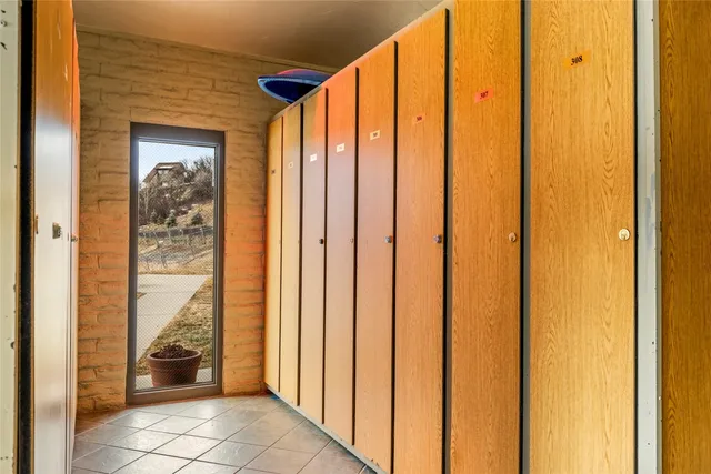 a view of a back yard from a hallway