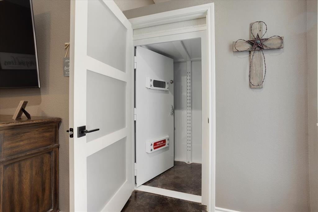 7250 North Fm 273 Ivanhoe, TX 75447 - Photo 13 of 40 a view of a room with a door and wooden door