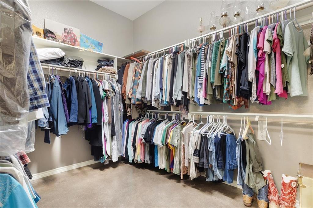 7250 North Fm 273 Ivanhoe, TX 75447 - Photo 16 of 40 a view of walk in closet with clothes