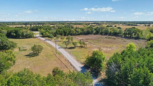 a view of a yard with an outdoor space