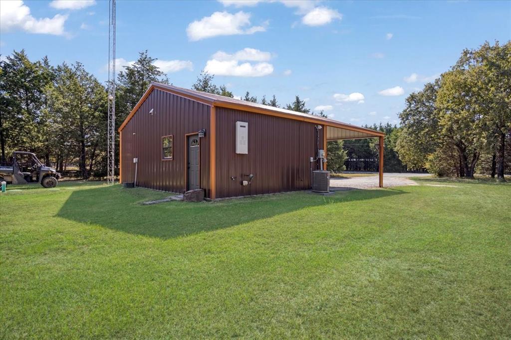7250 North Fm 273 Ivanhoe, TX 75447 - Photo 32 of 40 a view of a house with backyard and garden