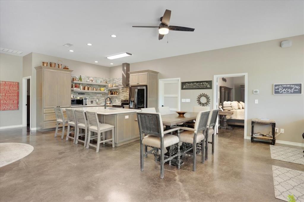 7250 North Fm 273 Ivanhoe, TX 75447 - Photo 8 of 40 a view of a dining area with furniture