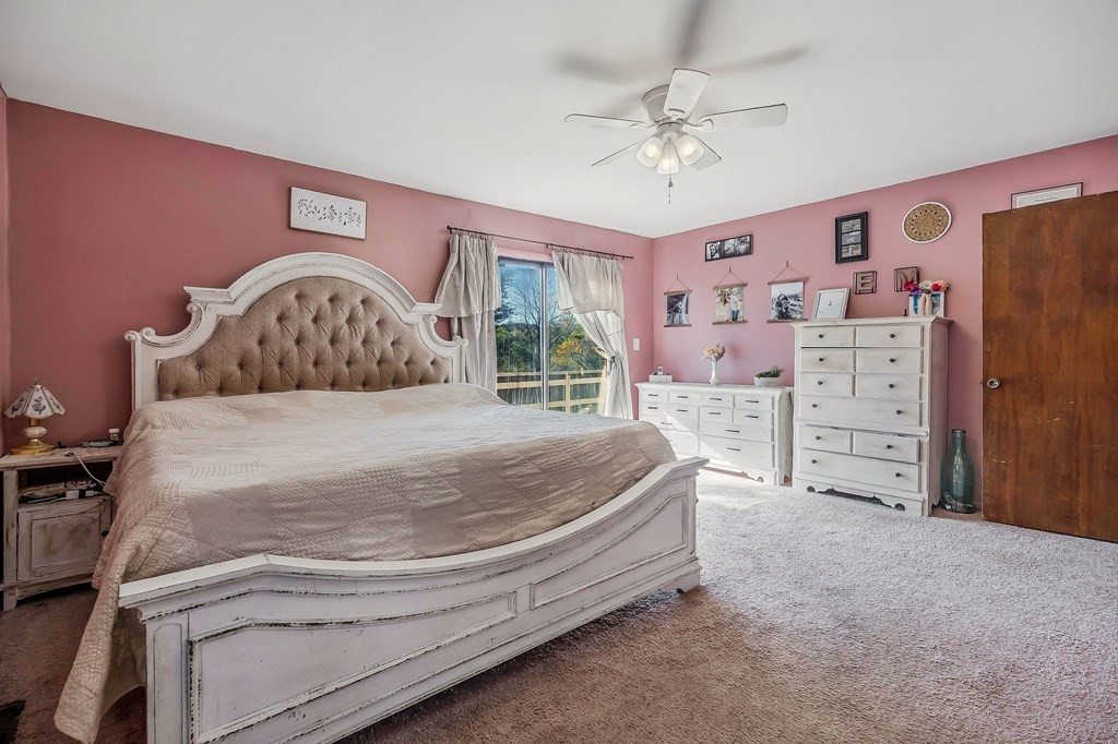209 Lankford Road Cookeville, TN 38506 - Photo 16 of 38 a spacious bedroom with a bed and a dresser