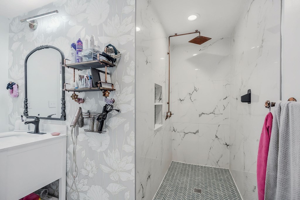 209 Lankford Road Cookeville, TN 38506 - Photo 18 of 38 a bathroom with a sink and a shower