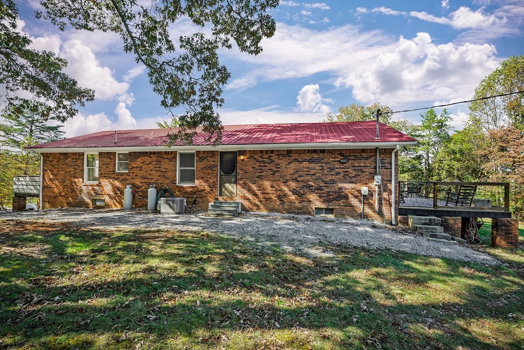 209 Lankford Road Cookeville, TN 38506 - Photo 30 of 38 a view of a house with backyard balcony and sitting area