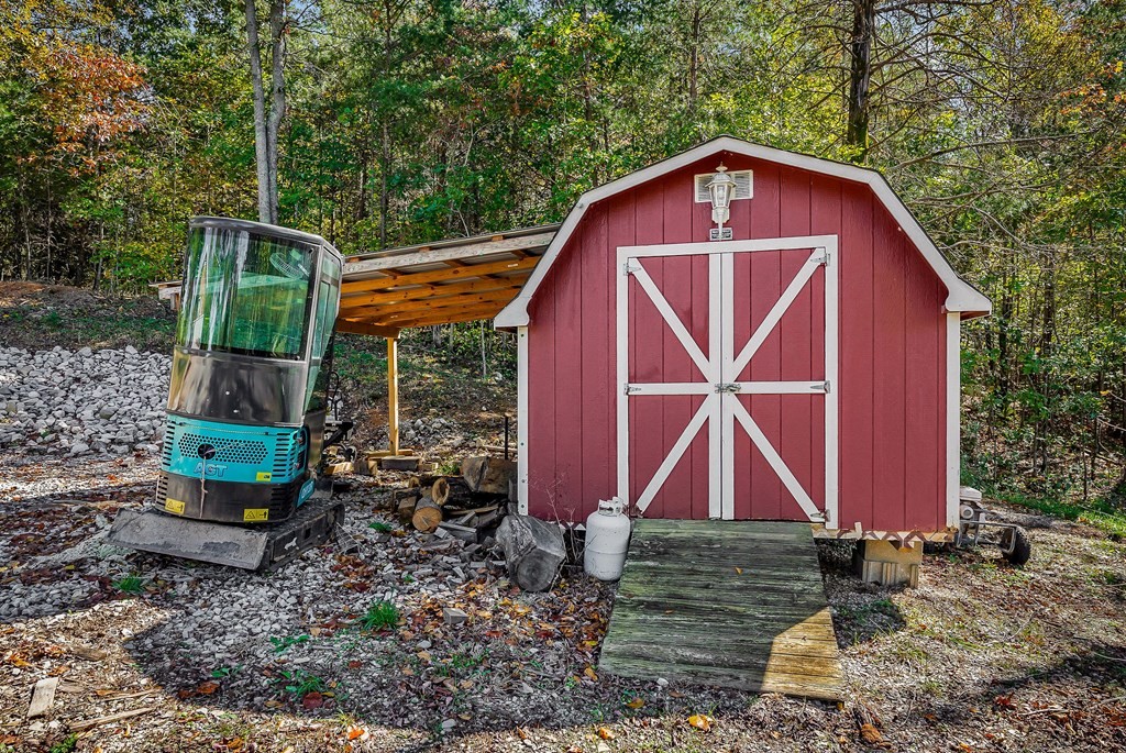 209 Lankford Road Cookeville, TN 38506 - Photo 38 of 38 a front view of a house with garden