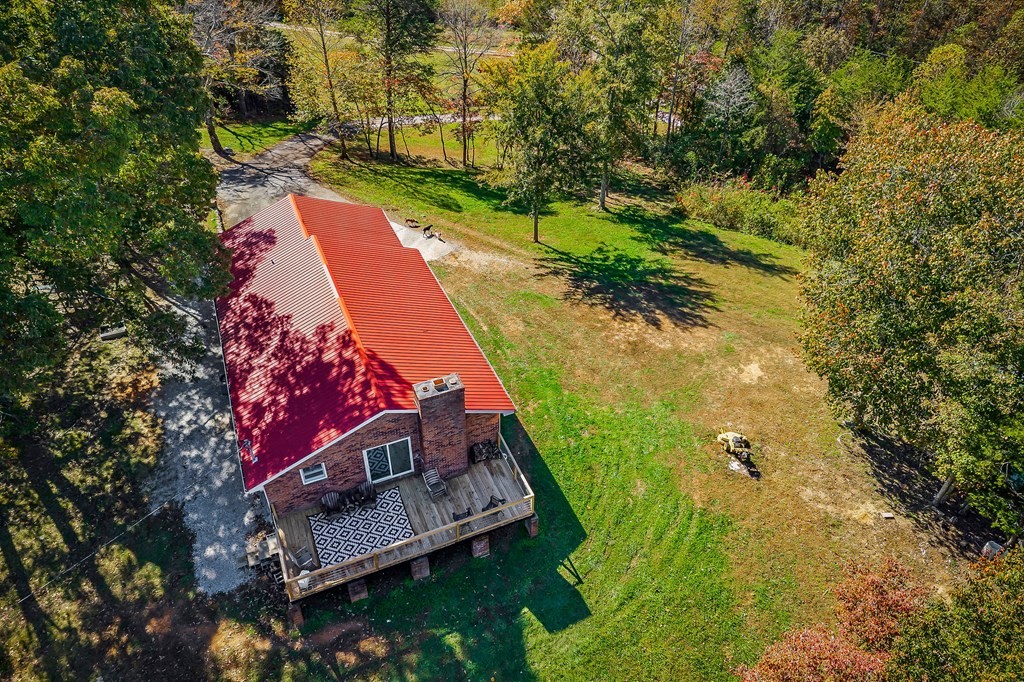 209 Lankford Road Cookeville, TN 38506 - Photo 4 of 38 a view of a yard with plants