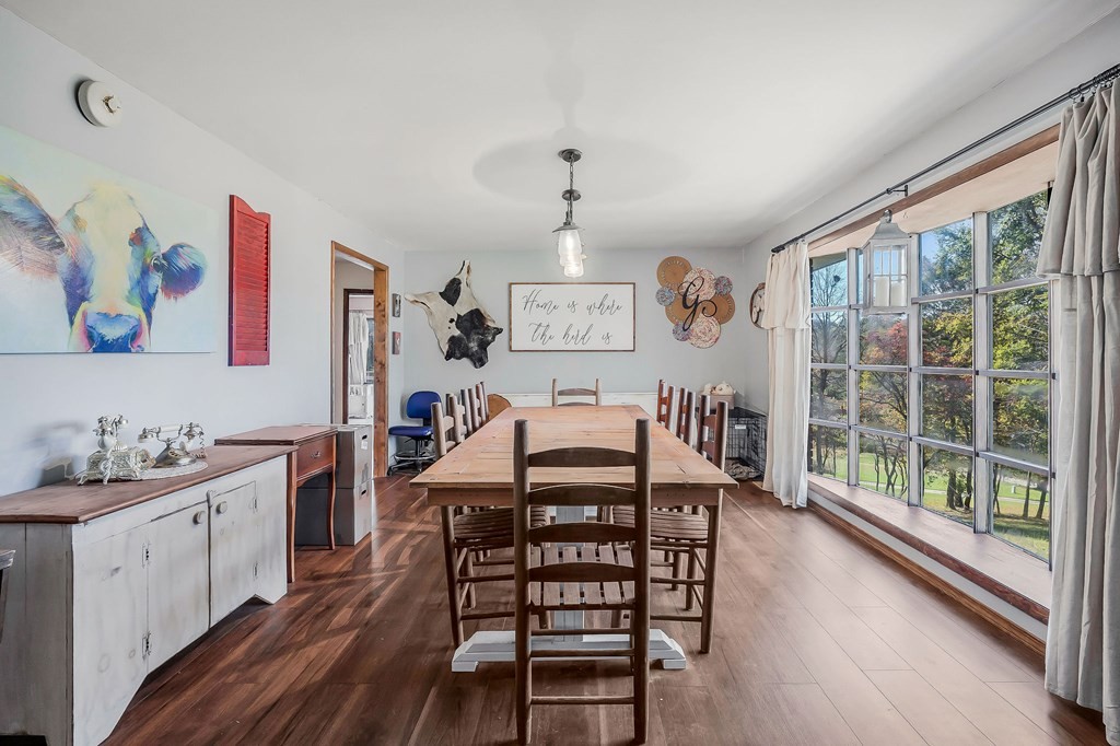 209 Lankford Road Cookeville, TN 38506 - Photo 8 of 38 a view of a dining room with furniture window and wooden floor