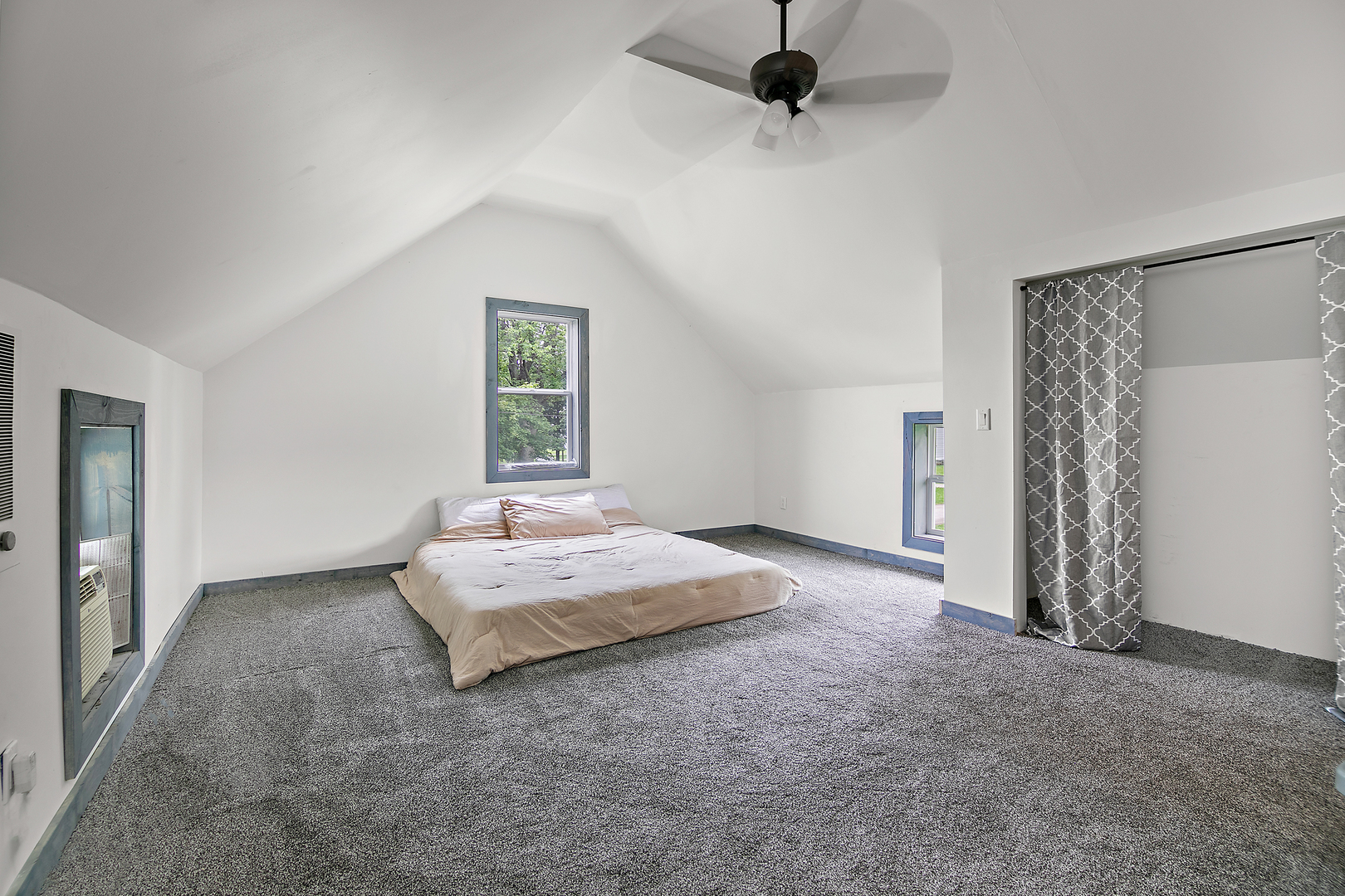 1506 East 2710 North Road Clifton, IL 60927 - Photo 12 of 21 a spacious bedroom with a bed and a window