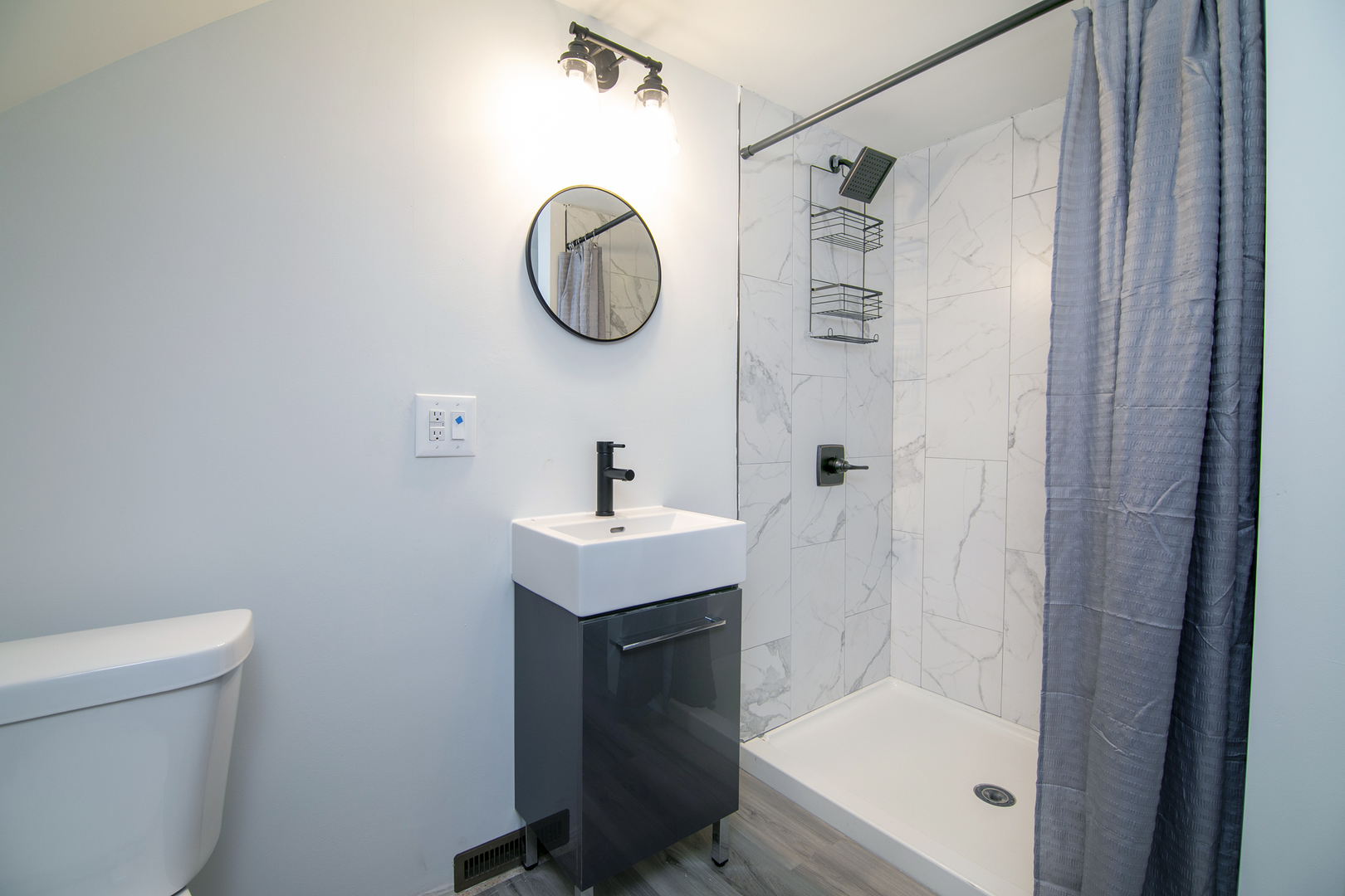 1506 East 2710 North Road Clifton, IL 60927 - Photo 13 of 21 a bathroom with a sink a toilet and shower