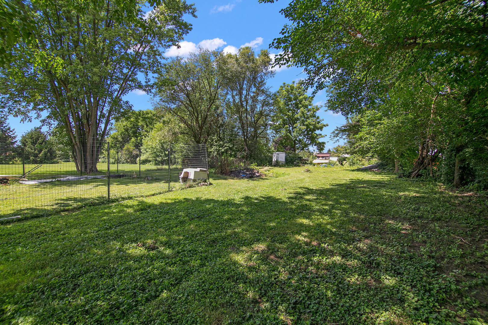 1506 East 2710 North Road Clifton, IL 60927 - Photo 17 of 21 a view of outdoor space with trees all around