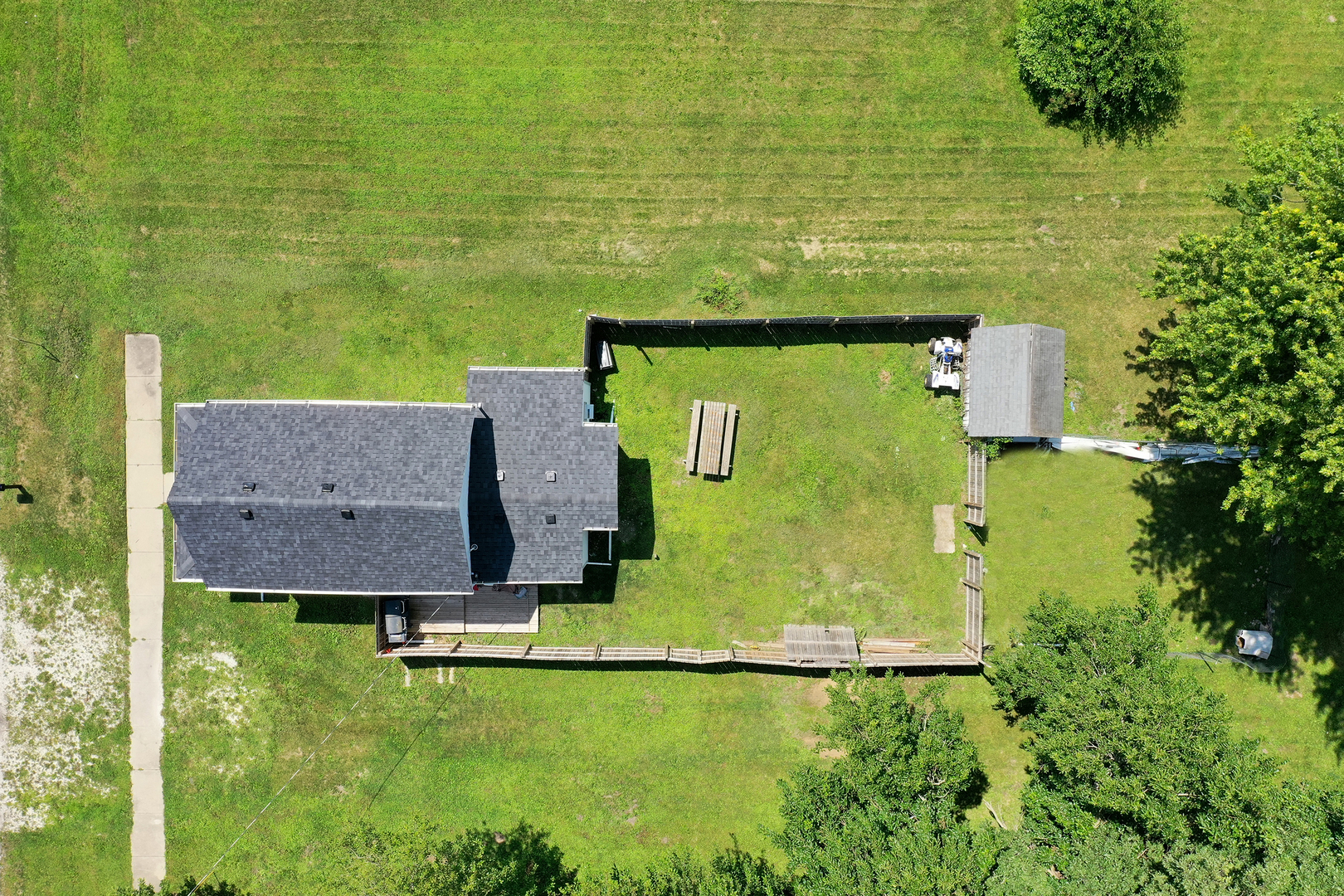 1506 East 2710 North Road Clifton, IL 60927 - Photo 19 of 21 an aerial view of a house with a garden