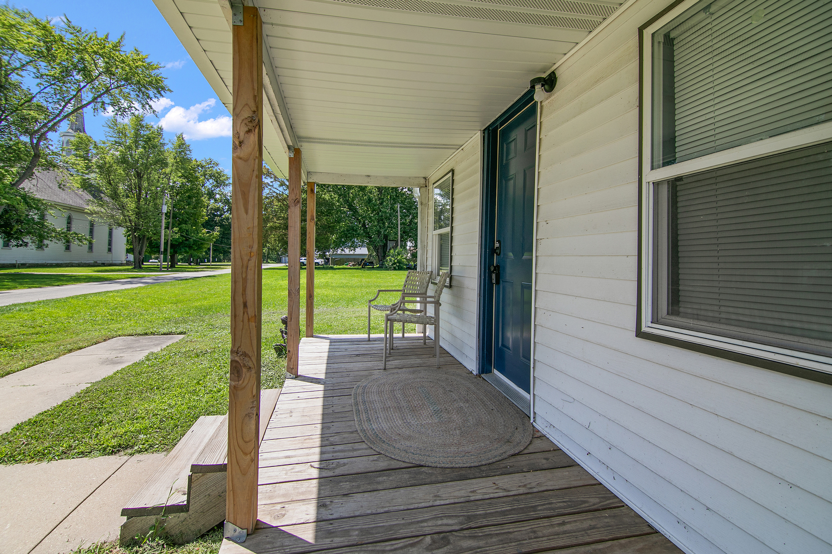 1506 East 2710 North Road Clifton, IL 60927 - Photo 2 of 21 a porch with seating space and garden view