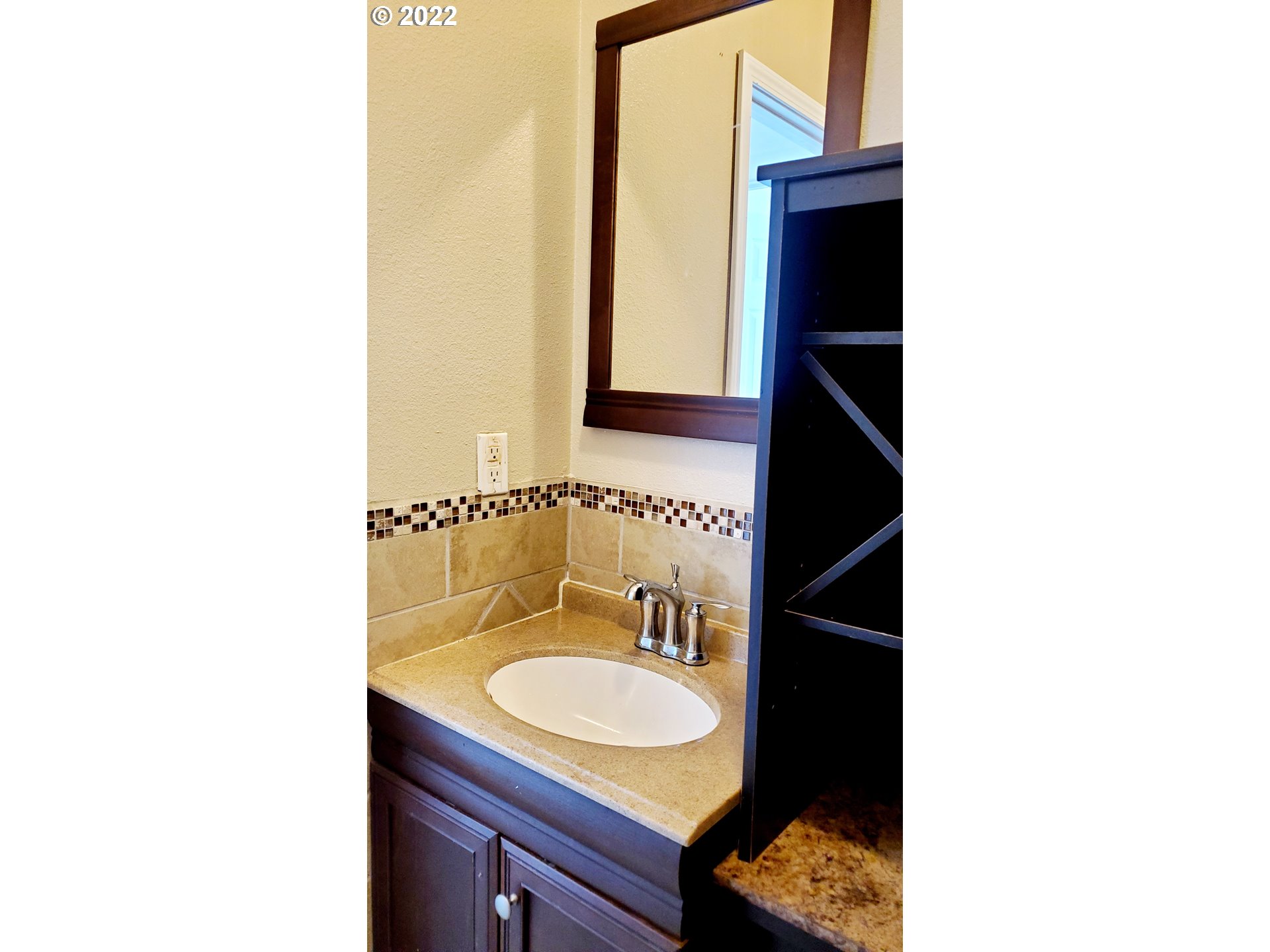 156 Oak Street Riddle, OR 97469 - Photo 21 of 23 a bathroom with a sink and a mirror
