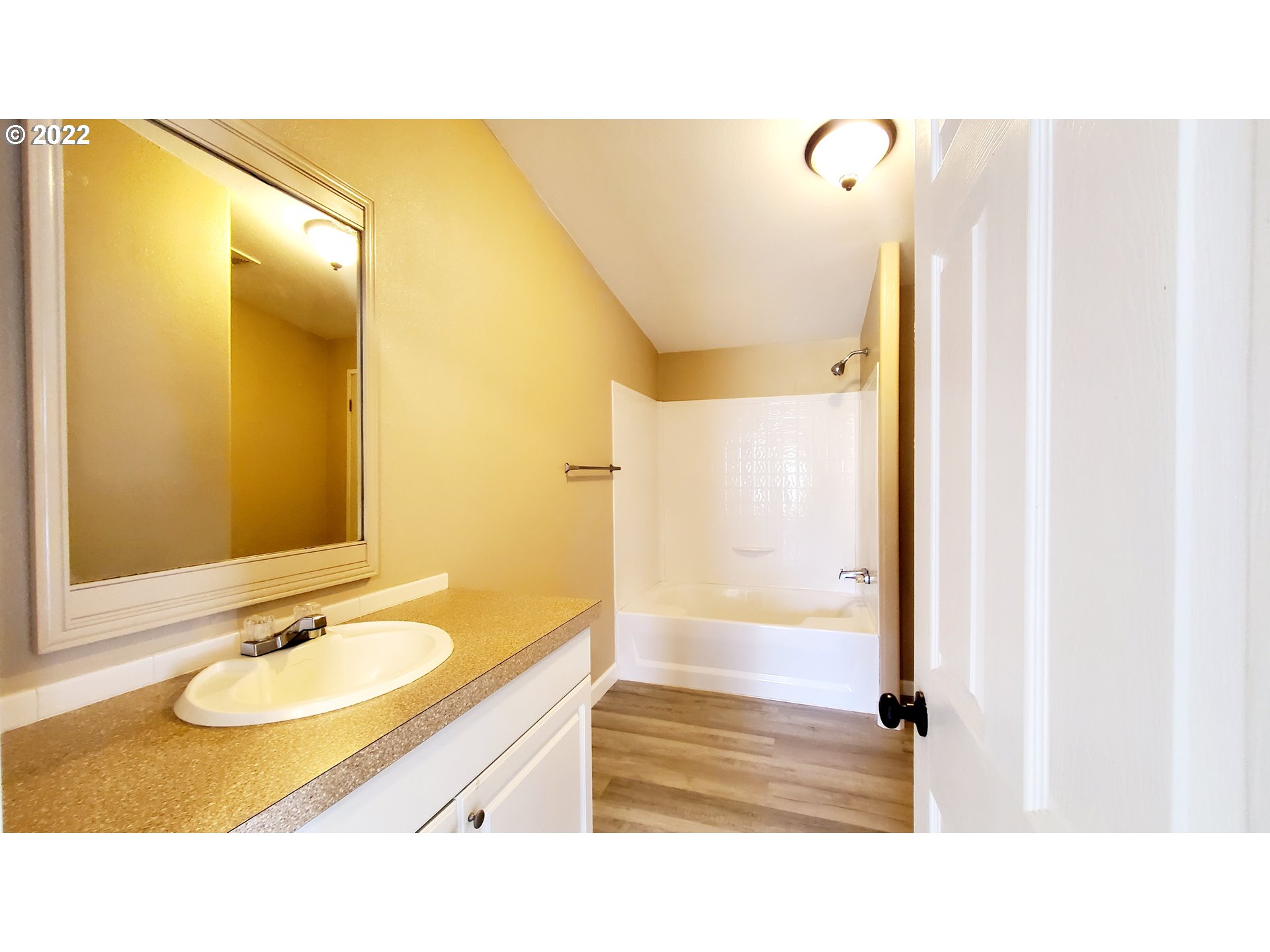 156 Oak Street Riddle, OR 97469 - Photo 5 of 23 a bathroom with a sink and a mirror
