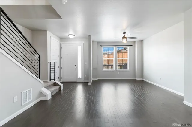 a view of a kitchen with a sink and cabinets