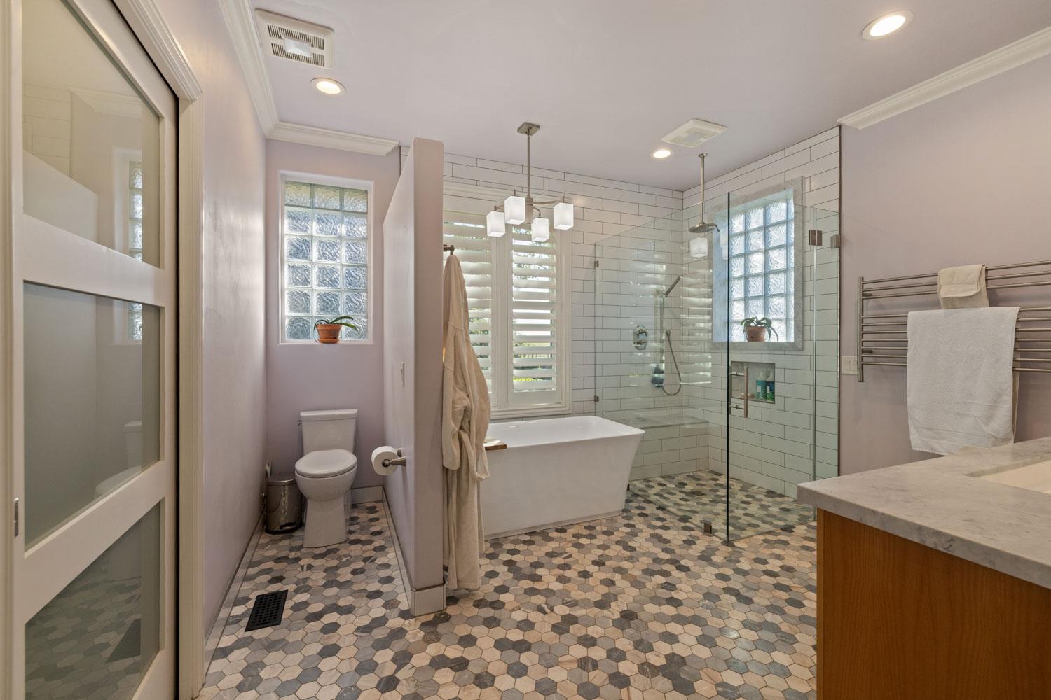 5288 West Kile Road Lodi, CA 95242 - Photo 19 of 45 a bathroom with a sink toilet and shower