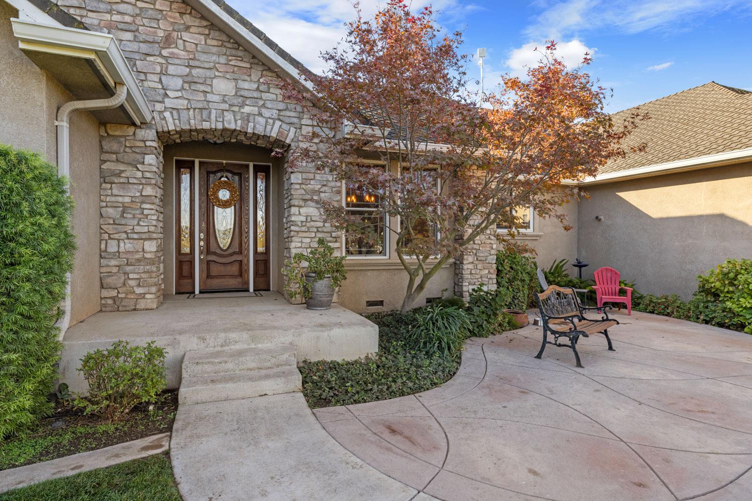 5288 West Kile Road Lodi, CA 95242 - Photo 5 of 45 a view of a chair and table in the front of house