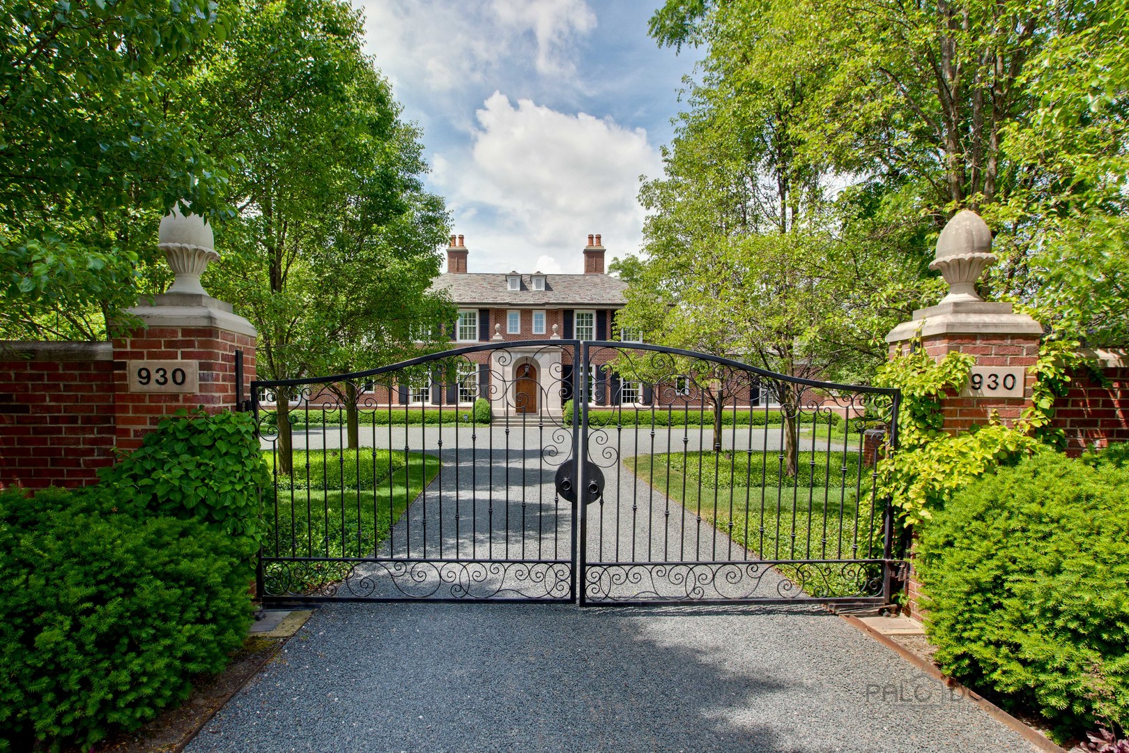 a view of a gate and fence