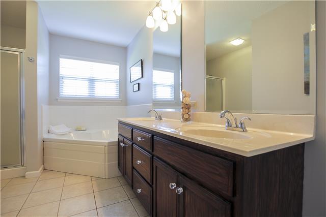 5047 Highpoint Road Pleasant View, TN 37146 - Photo 10 of 20 This spa like master bath has it all and a spacious functional layout.