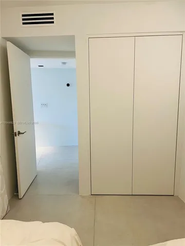 a bathroom with a sink a toilet and a shower