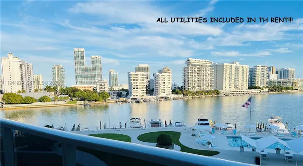 a view of a lake with a city