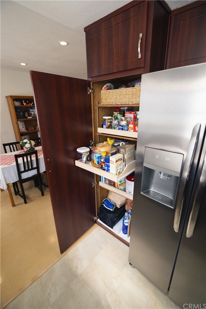 1812 Huntington Drive Duarte, CA 91010 - Photo 17 of 28 a kitchen with stainless steel appliances a refrigerator and a stove top oven