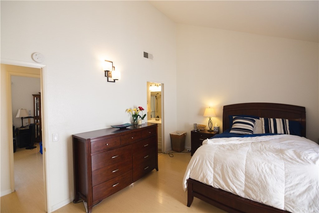 1812 Huntington Drive Duarte, CA 91010 - Photo 22 of 28 a bedroom with a bed and a dresser