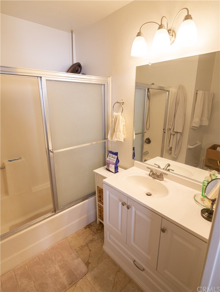 1812 Huntington Drive Duarte, CA 91010 - Photo 23 of 28 a bathroom with a sink and mirror