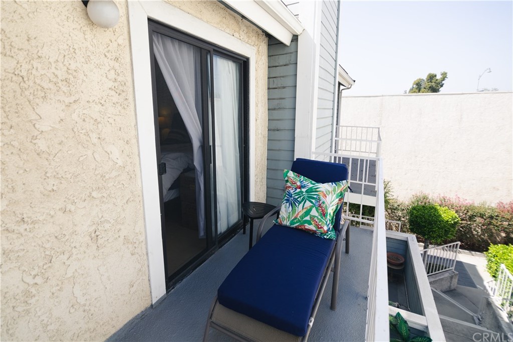 1812 Huntington Drive Duarte, CA 91010 - Photo 24 of 28 a view of balcony with chair and potted plants
