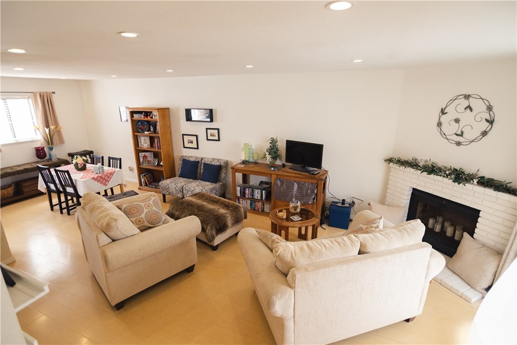 1812 Huntington Drive Duarte, CA 91010 - Photo 5 of 28 a living room with furniture a fireplace and a flat screen tv