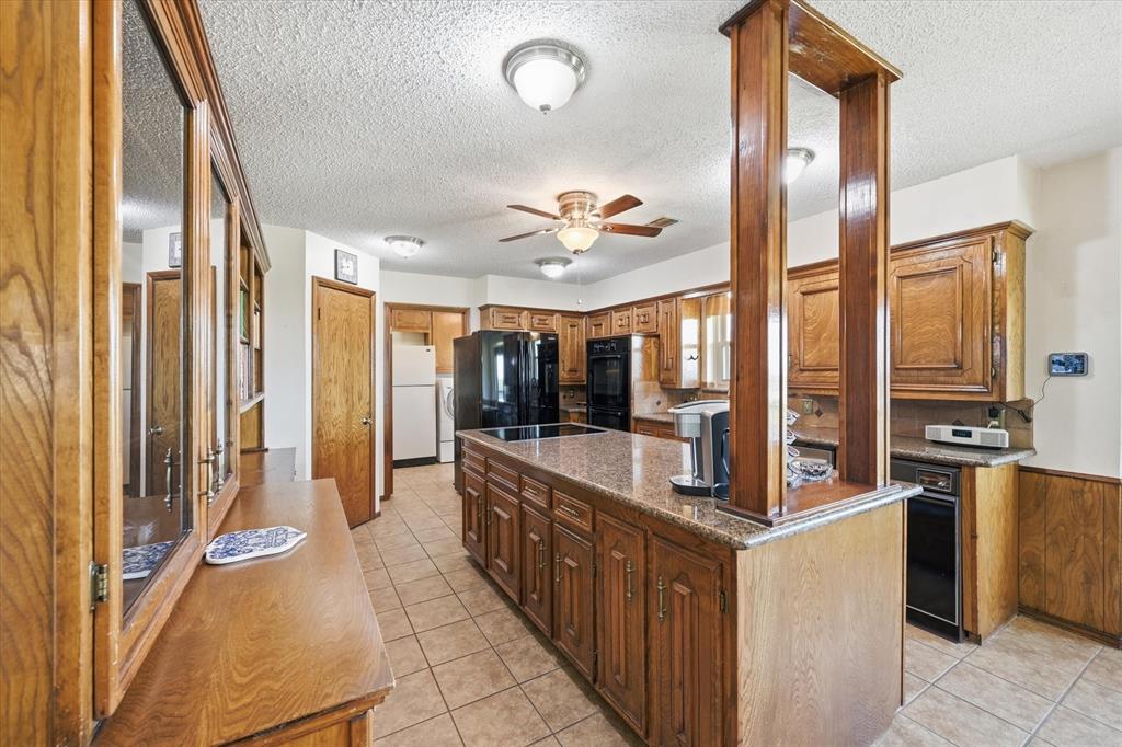 12099 County Road 1028 Blue Ridge, TX 75424 - Photo 13 of 36 a very nice looking kitchen with a large window